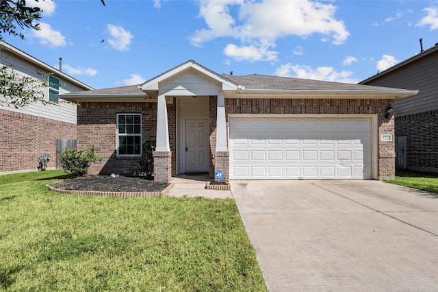 ranch-style house with a garage and a front yard