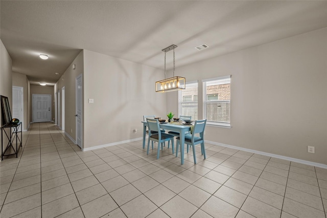 view of tiled dining space