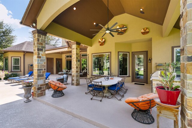 view of patio / terrace featuring ceiling fan