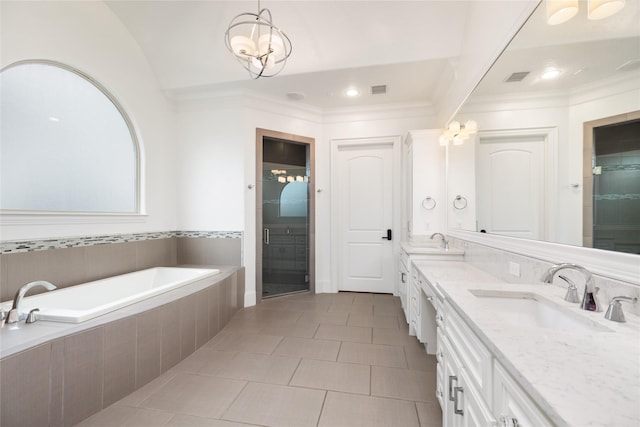 bathroom featuring plus walk in shower, tile patterned floors, vanity, and crown molding