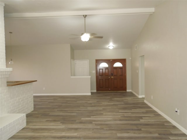 entryway featuring ceiling fan, lofted ceiling, and dark wood-type flooring