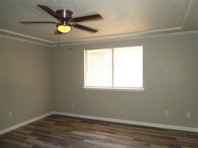 unfurnished room with ceiling fan, ornamental molding, a textured ceiling, and dark hardwood / wood-style flooring