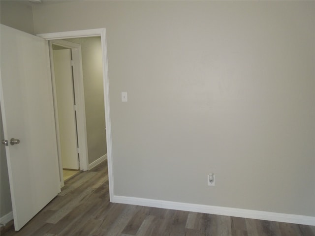 spare room featuring hardwood / wood-style flooring