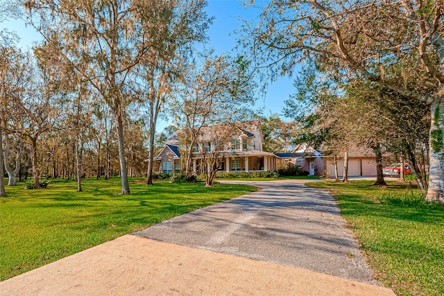 view of front of home featuring a front lawn and a porch