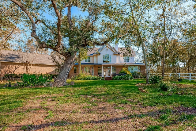 view of front facade with a front yard