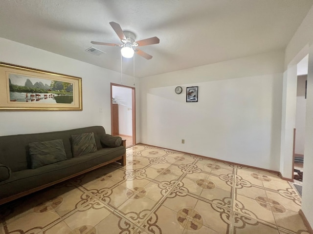 living room featuring ceiling fan