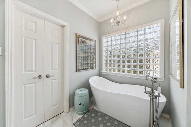 bathroom with a soaking tub, crown molding, marble finish floor, and baseboards