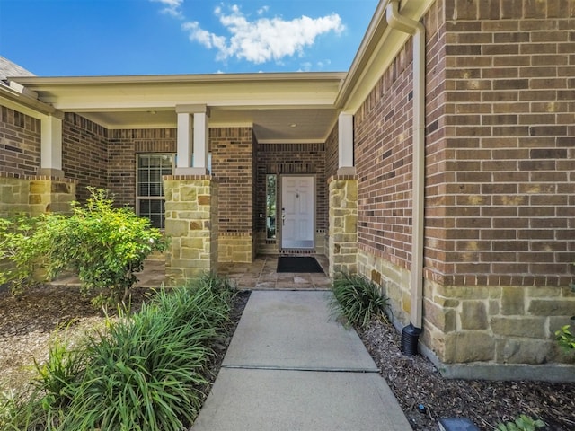 entrance to property with a porch