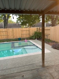 view of pool with a patio and a jacuzzi