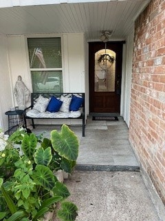 property entrance with covered porch