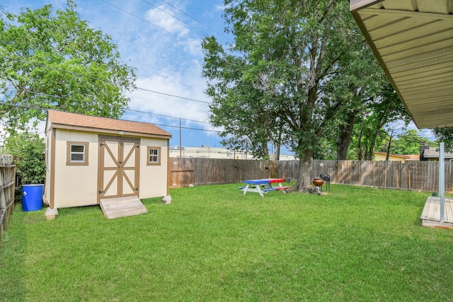 view of yard featuring a storage shed