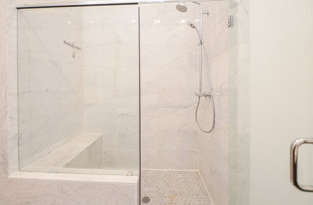 bathroom featuring an enclosed shower