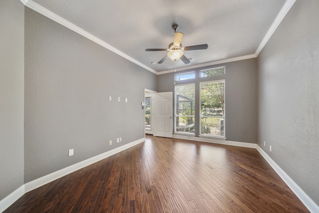 empty room featuring ornamental molding, ceiling fan, and hardwood / wood-style flooring