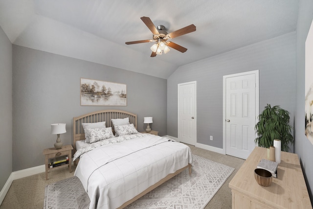 bedroom with ceiling fan and vaulted ceiling