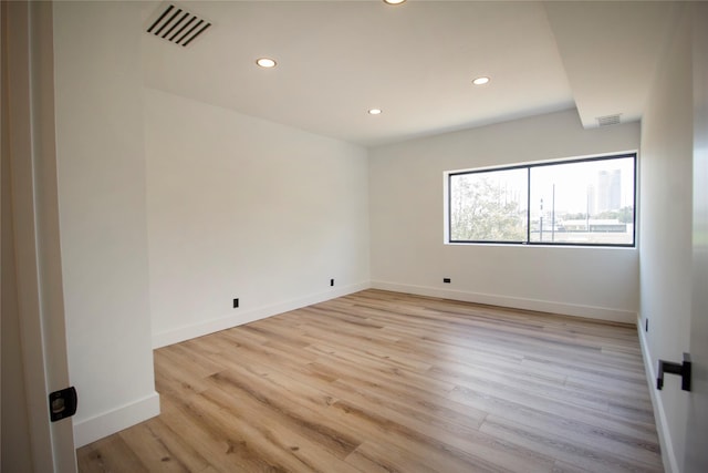2929 Buffalo Speedway Unit A204, Houston, TX 77098 - spare room with recessed lighting, light wood-style flooring, and baseboards