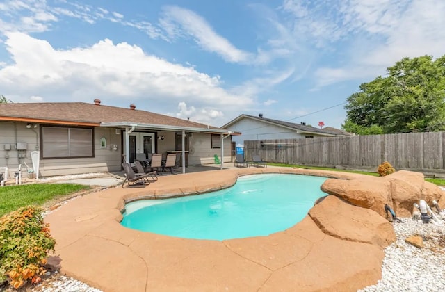 view of pool featuring a patio