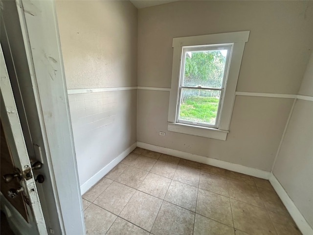 view of tiled spare room