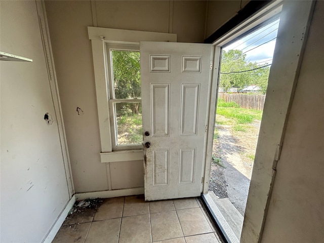 entryway featuring light tile patterned flooring