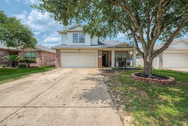 view of front facade featuring a front lawn and a garage