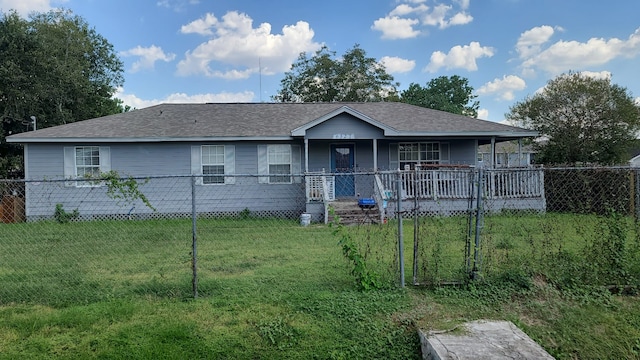 ranch-style home featuring a porch and a front lawn