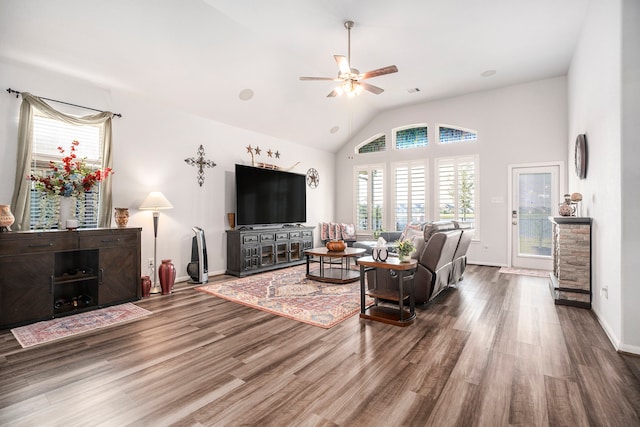 living room with ceiling fan, wood-type flooring, and lofted ceiling