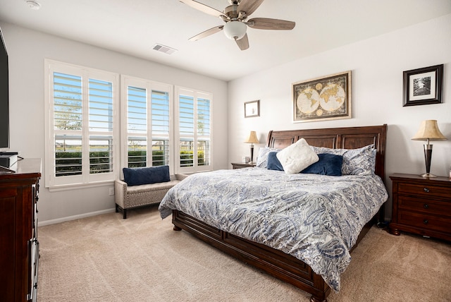 bedroom with ceiling fan and light colored carpet