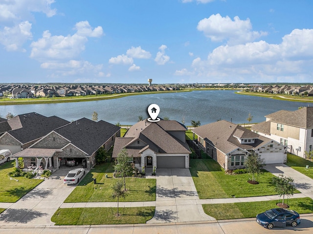 bird's eye view with a water view