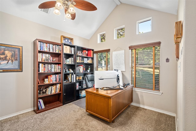 carpeted office space with beamed ceiling, ceiling fan, and high vaulted ceiling