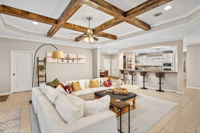 living room with coffered ceiling, beamed ceiling, and light tile patterned floors