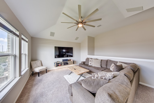 carpeted living room featuring ceiling fan and lofted ceiling