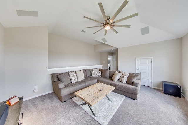 living room featuring vaulted ceiling, carpet, and ceiling fan