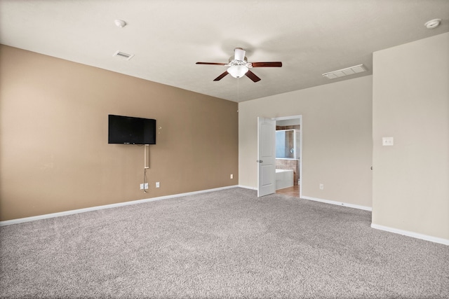 unfurnished room with carpet flooring and ceiling fan