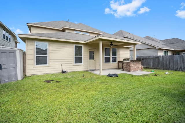 back of house featuring a patio, a yard, area for grilling, and ceiling fan