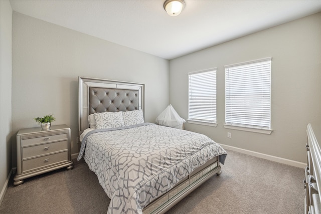 bedroom featuring carpet