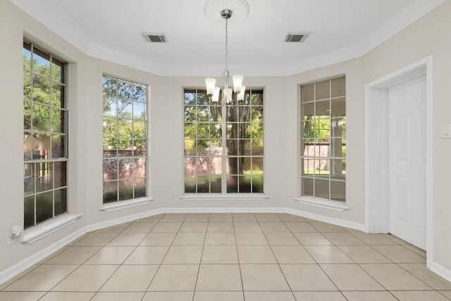 unfurnished sunroom featuring an inviting chandelier