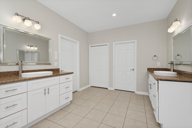 bathroom featuring tile patterned floors and vanity