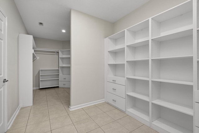 82 Champion Villa Dr, Houston, TX 77069 - spacious closet with visible vents and light tile patterned floors