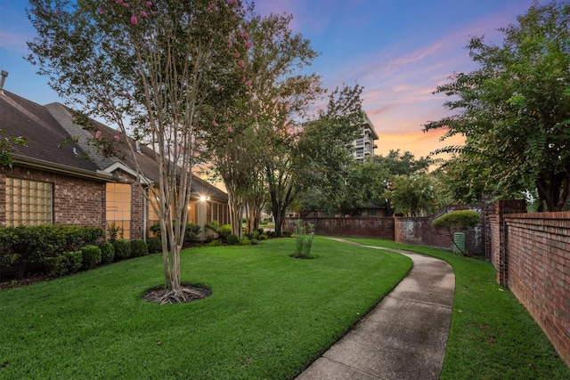 82 Champion Villa Dr, Houston, TX 77069 - yard at dusk with fence