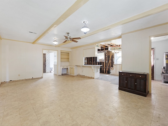 unfurnished living room with ceiling fan and crown molding