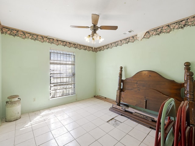 bedroom featuring ceiling fan and light tile patterned flooring