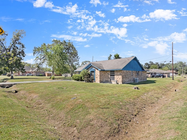 view of front of home with a front lawn