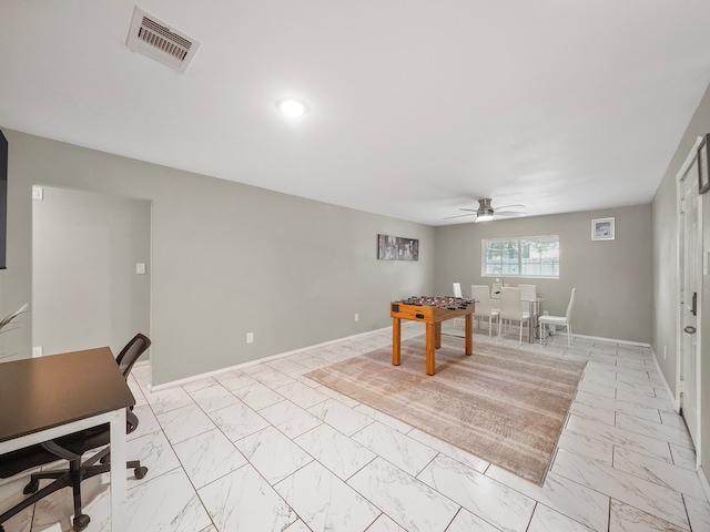 playroom featuring ceiling fan