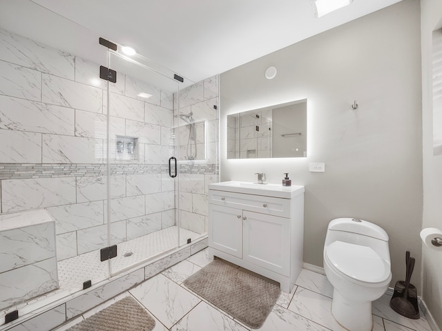 bathroom featuring vanity, toilet, and an enclosed shower