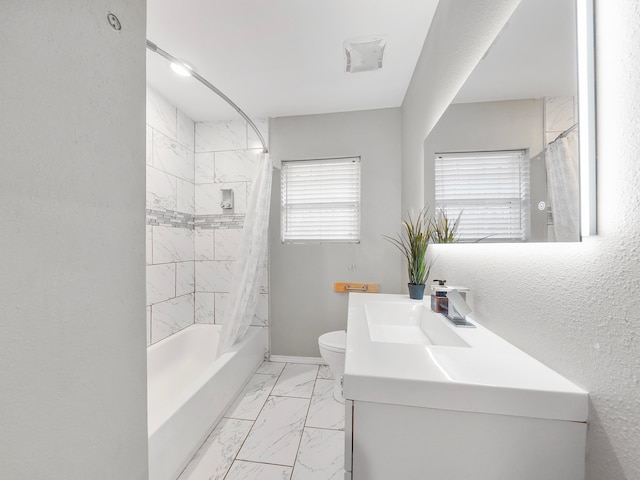 full bathroom featuring shower / bathtub combination with curtain, vanity, and toilet