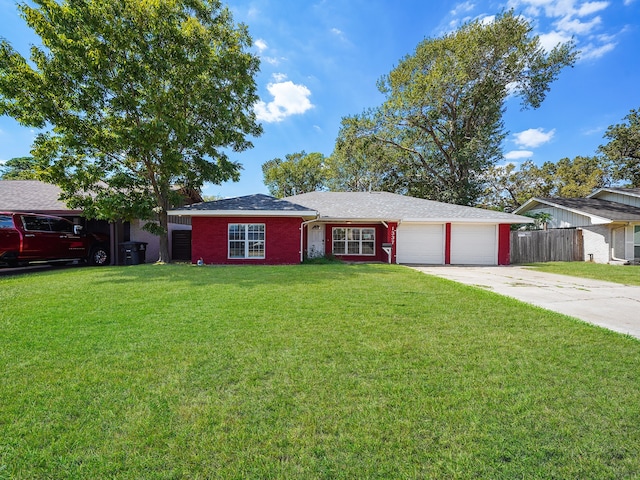 ranch-style house featuring a garage and a front yard