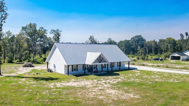 view of front of house featuring a front lawn and a porch