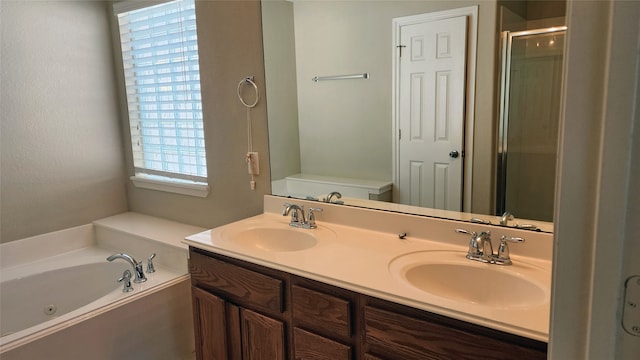 full bathroom with vanity, toilet, and independent shower and bath