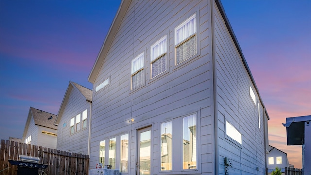 view of property exterior at dusk