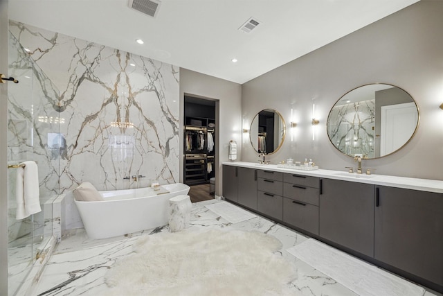 bathroom with a bathtub and vanity