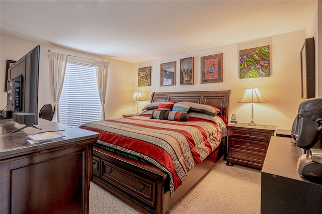 bedroom with light colored carpet